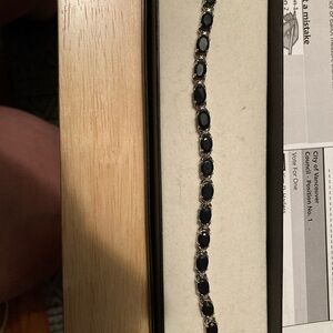 New Elegant Tennis Silver Bracelet with Dark Sapphires and two Diamonds.